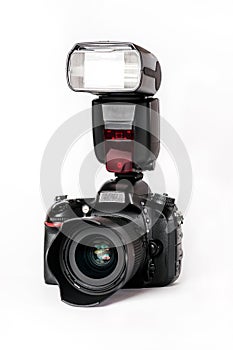 Digital camera with flash on white background