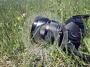 Digital camera on grass