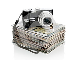 The digital camera and the heap of photos