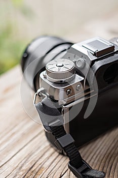 Digital camera mirrorless camera ready for take a photo. Modern MILC camera shooting outdoors photograpy