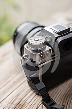 Digital camera mirrorless camera ready for take a photo. Modern MILC camera shooting outdoors photograpy photo