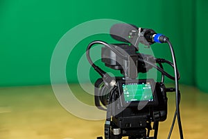 Digital camera in a television Studio. Filming on green screen chroma key