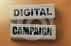 Digital Campaign written on wood blocks on red. Online business concept