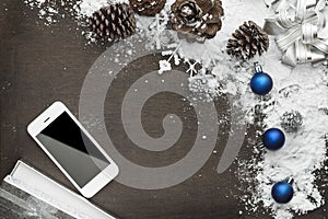 Digital christmas background with mobile phone