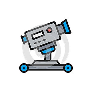 Digital cinema camera on wheels flat color line icon.