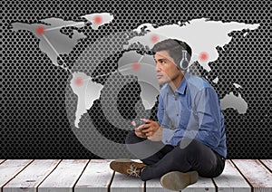 Businessman playing with computer game controller