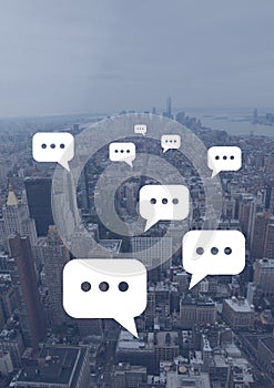 Chat bubble icons over city