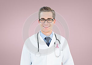 Doctor man with breast cancer awareness ribbon