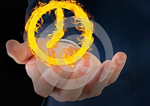 hand with clock fire icon over. Black background