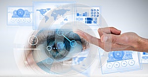 Hand touching and interacting with technology interface panels with eye
