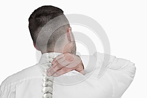 Digital composite of highlighted spine of man with back pain