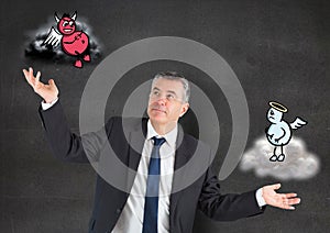 Digital composite image of a businessman holding angel and demon