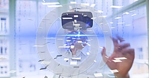 Digital composite image of businessman wearing VR glasses