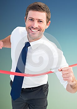 Digital composite image of a businessman winning the race