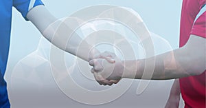 Digital composite image of cloud icon against mid section of two sportsmen shaking hands