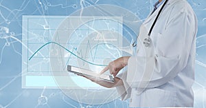 Digital composite image of doctor using tablet computer with interface graphics