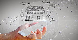 Digital composite image of hand holding smart phone with house against networking background