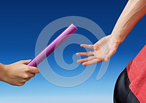Digital composite image of hands passing the baton