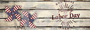 Composite image of digital composite image of happy labor day and god bless america text