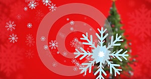 Digital composite image of snowflakes and christmas tree against red background with copy space