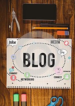 Table top with a notebook with web graphics