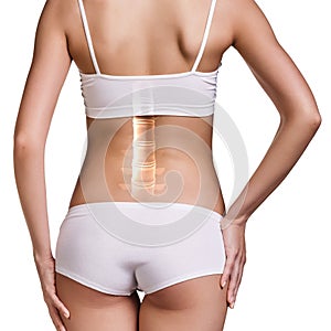 Digital composite of woman with back pain