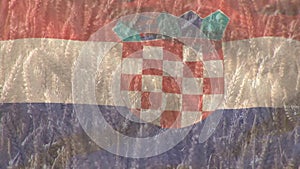 Digital composition of waving croatia flag against close up of crops in farm field