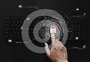 Digital computer security and safety system technology, Hand pushing on computer keyboard with lock icon technology