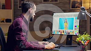 Digital content creator retouching photos for a client