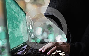 Digital data security system and protection. Anonymous hacker try to hacking on computer laptop