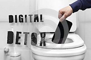 Digital detox inscription, refusal of the phone. a man's hand throws the phone into the toilet because of a breakdown or