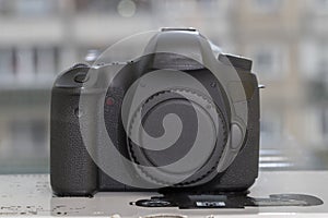 Digital DSLR camera on blured background