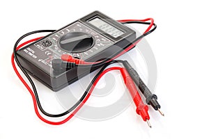 Digital electrical tester multimeter in black case isolated on white background. Digital multimeters have a numeric display, can