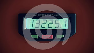 Digital electricity meter showing household consumption in kilowatt hours