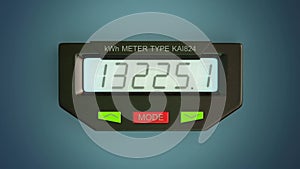 Digital electricity meter showing household consumption in kilowatt hours