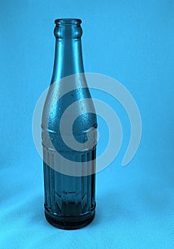 Digital enhanced bottle photo.