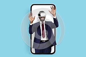 Digital Entertainment. Black Businessman In Vr Glasses Looking Out Of Big Smartphone