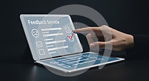 Digital Feedback: A Hand Interacts with Tablet Survey