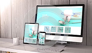 Digital generated devices on desktop, responsive dental clinic website design on screen. All screen graphics are made up. 3d
