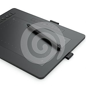 A digital graphics tablet with a sleek black surface and a stylus resting on it. The tablet