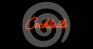 Digital image of neon orange cocktails text sign against black background