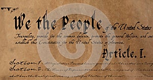 Digital image of a written constitution of the United States zooming in and out of the screen agains