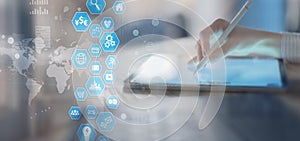 Digital Interface and Application Icons on a Touchscreen Tablet