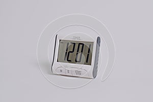 Digital kitchen timer on white background