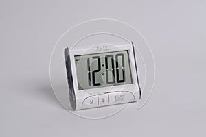 Digital kitchen timer on white background