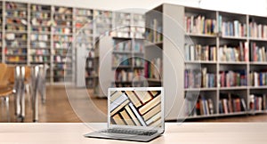 Digital library concept. Laptop on table indoors