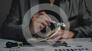 Digital marketing 2023 goals. Businessman analyzing internet marketing online, 2023 business planning, business skyrocket, online