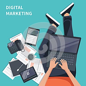 Digital marketing concept. Man sitting on the floor and holding lap top in his lap and working