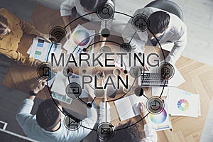 Digital marketing plan. People working at table