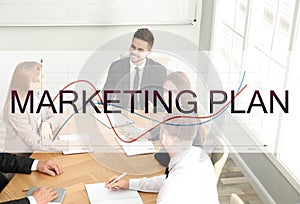 Digital marketing plan. Team of professionals working together at table